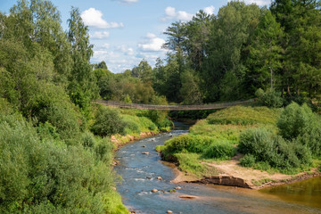 Fototapeta na wymiar Belaya River flows into the river Msta