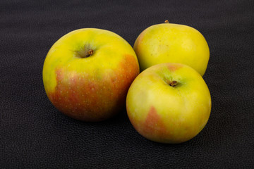 Ripe apples over background