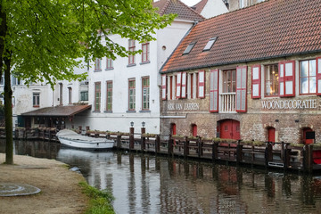 Fototapeta premium Brugge streets and Architecture with canals and historical buildings. Popular touristic destination of Belgium. Brugge, Belgium