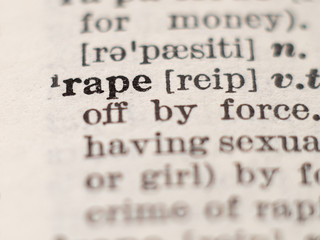 Obraz premium Dictionary definition of word rape, selective focus.