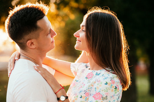 young couple in love at sunset.portrait photos of lovers