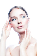 Attractive beautiful young model woman touching perfect face skin. Hairstyle, natural nude makeup. Isolated. White background