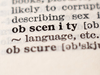 Obraz premium Dictionary definition of word obscenity, selective focus.