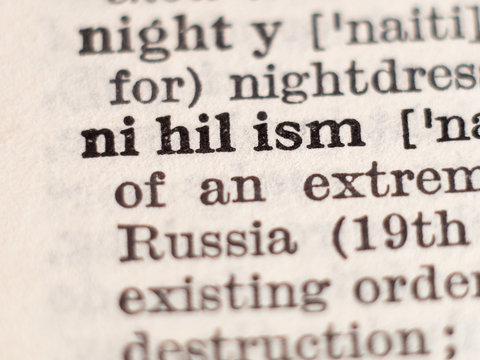 Dictionary definition of word nihilism, selective focus.
