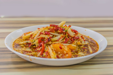 Spicy papaya salad and delicious makes feel saliva flow.