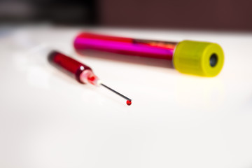 Syringe needle and tube with blood