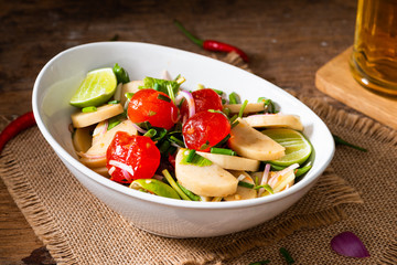 Spicy Salted egg yolk salad in white bowl