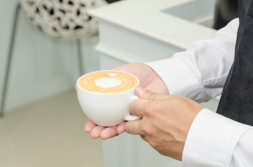 man with cup of coffee