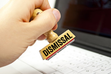 Stamp with laptop keyboard with term dismissal termination
