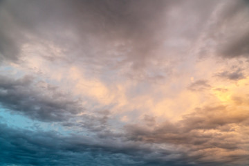Fototapeta na wymiar Dramatic sky with colorful clouds