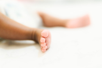 baby feet on white background
