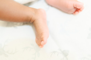 baby feet on white background