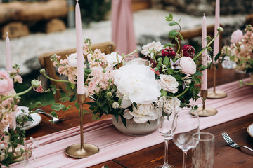 Rustic style wedding table decoration and floristics design