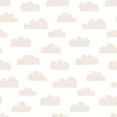 Hand drawn seamless vector pattern with clouds, on a white background. Scandinavian style flat design. Concept for children summer textile print, wallpaper, wrapping paper.