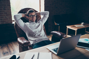 Portrait of attractive cheerful smart clever pr development status executive partner director preparing finance report presentation at industrial loft brick style interior work place station indoors