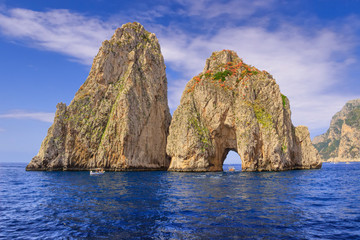 Fototapeta The Faraglioni Rocks on the coast of the island of Capri, Italy. Capri stacks, the symbol of the island, located in the gulf of Naples, Campania. obraz