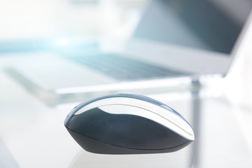 Computer wireless mouse on glass