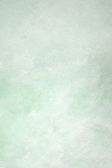 Gradient pastel green grunge effect textured background