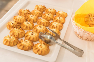 Cretan Sweet Cheese Pastries (Kalitsounia) on the table of the hotel restaurant, as a gift for...