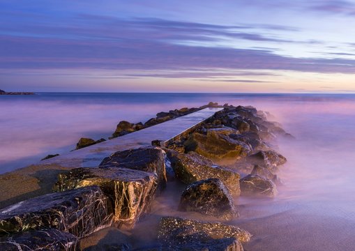 Concrete pier, at dusk, Levanto, Liguria, Italy, Europe