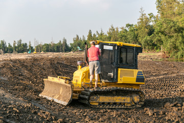 Bulldozer. Mechanical Site Preparation. Heavy-duty construction for increased shear stress on tracks with increased roots and stumps.