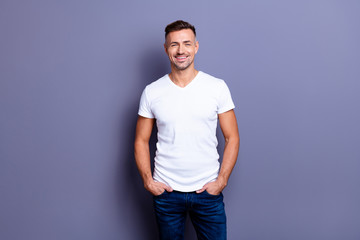 Close up photo amazing he him his middle age macho perfect appearance easy-going reliable person show white teeth bristle wear casual jeans denim pants trousers white t-shirt isolated grey background