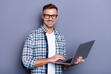 Close up photo handsome attractive he him his cheer guy hands arms hold notebook writing checking...