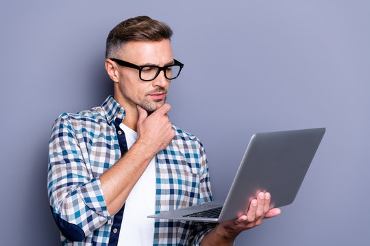 Close up photo handsome attractive he him his guy hands arms chin hold notebook think over new startup investment reader statistics data wear casual plaid checkered shirt isolated grey background