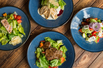 The tasty salads on a table.