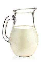 Jug with fresh organic milk. Isolated on white background. Stock photo.