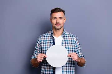 Close up photo handsome he him his guy arms hands holding round circle shape figure form paper list creative designer image picture wear casual plaid checkered shirt isolated grey background