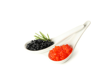 Glass spoons with caviar isolated on white background