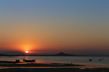 Fototapeta na wymiar Sunset on the Mar manor sea in Cabo de Palos, Murcia, Spain