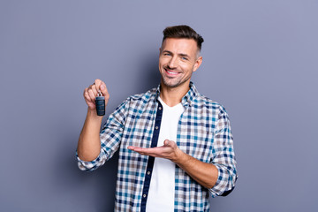Portrait of his he nice attractive confident cheerful glad bearded guy wearing checked shirt...