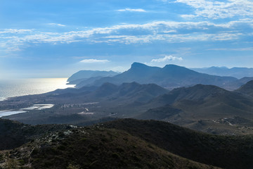 Naklejka na ściany i meble Mountains and coastline landscape of the National Park of Calblanque in Murcia, Spain.