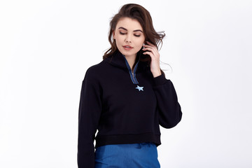 Fototapeta premium Sexy pretty fashion woman wear skirt sweater trend clothes collection catalogue long brunette hair party style model pose bright make-up beautiful face dress code office casual accessory shoes.