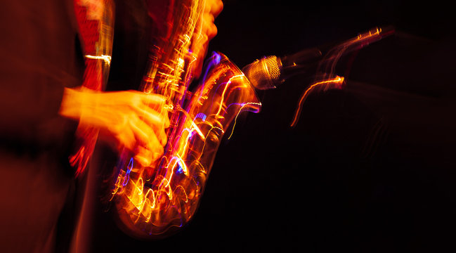 Saxophone player performing on stage