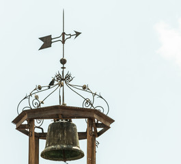 metal bell with weather vane
