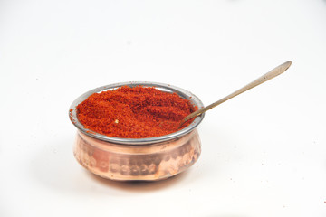 indian red chili powder isolated on white background