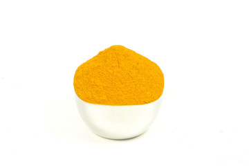 Turmeric powder isolated on a white background