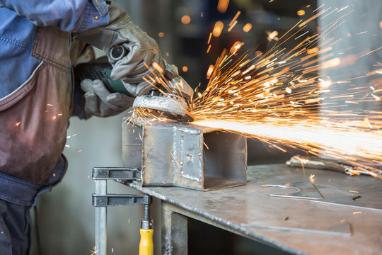 Grinding of materials in metallurgy workshop