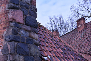 Chimney in the foreground on the roof