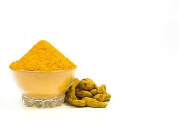 Turmeric powder isolated on a white background