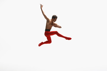 Fototapeta na wymiar Graceful classic ballet dancer dancing isolated on white studio background. Man in bright red clothes like a combination of wine and milk. The dance, grace, artist, movement, action and motion concept