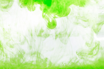 light green paint diluted in water on white background