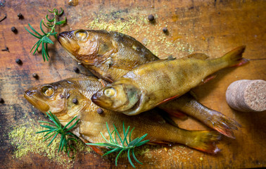 smoked flavored fish on a plate with spices