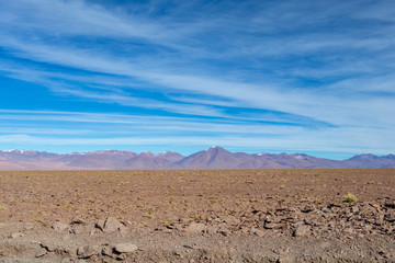 Background with barren desert scenery in the Bolivian Andes, in the Nature reserve Edoardo Avaroa