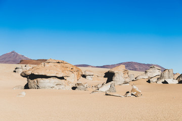 Background with barren desert scenery in the Bolivian Andes, in the Nature reserve Edoardo Avaroa