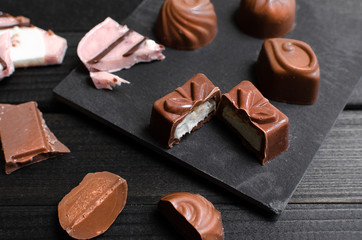 chocolate candies in the different forms and taste