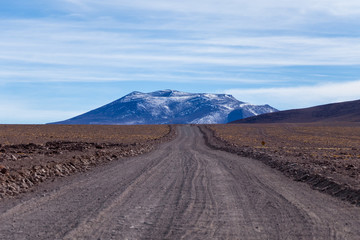 Background with barren desert scenery in the Bolivian Andes, in the Nature reserve Edoardo Avaroa